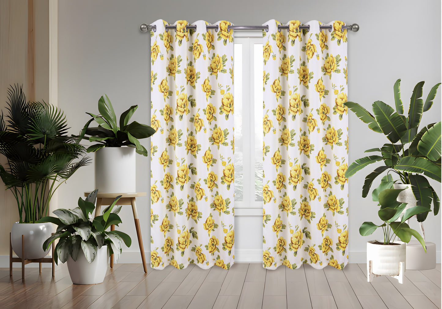 Floral patterned curtains with yellow flowers on a white background, hanging in a room with plants.