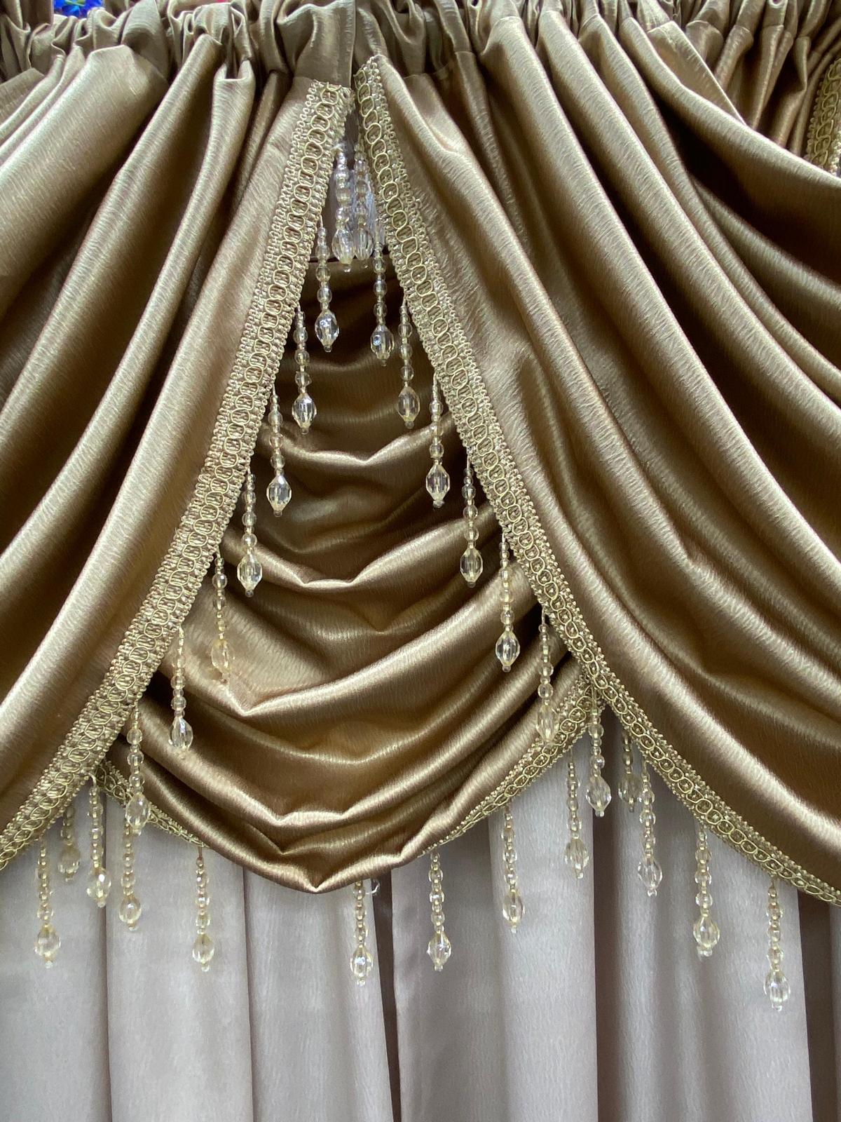 luxury gold waterfall valance curtain close-up with crystal beads