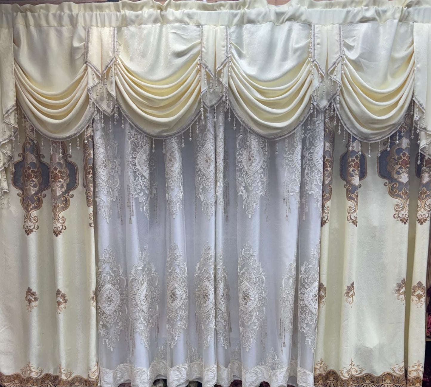 Jenifer beige 7-piece embroidered curtain set with 118-inch wide swag valance