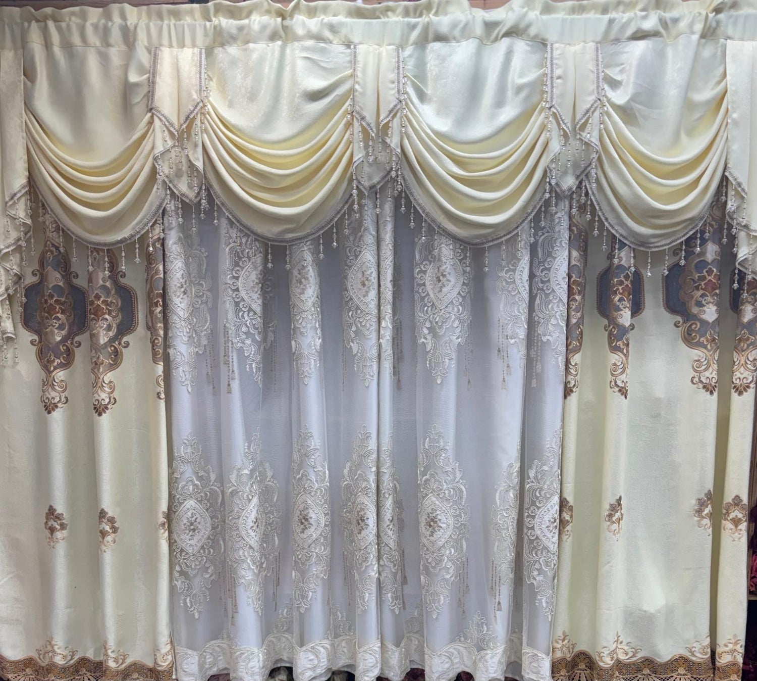 Jenifer beige 7-piece embroidered curtain set with 118-inch wide swag valance