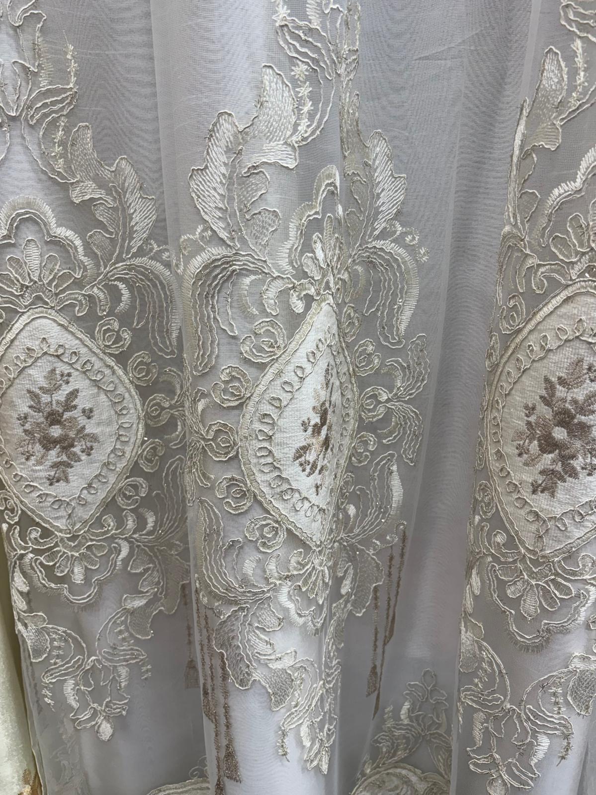Close-up of embroidered detailing on Jenifer beige curtain panel